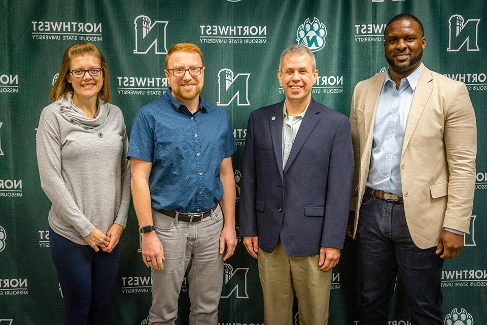 Four employees recognized for commitment to diversity, inclusion
